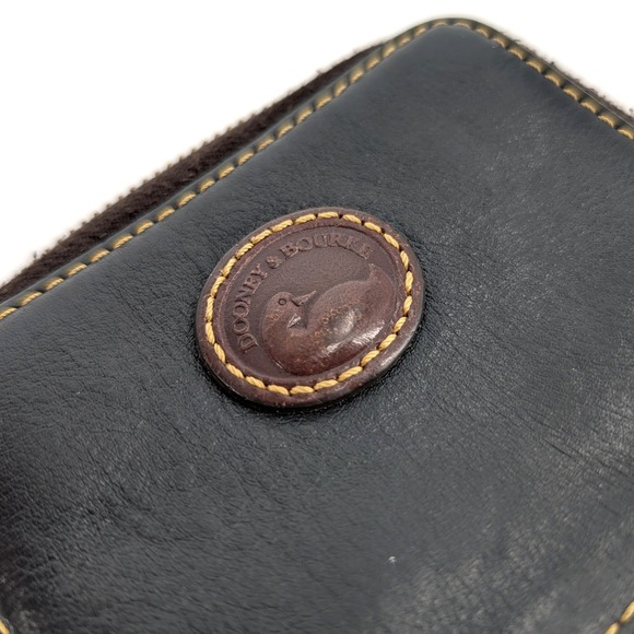 Dooney & Bourke Handbags - Vintage Dooney Bourke AWL Zip Around Wallet Black Leather Red Interior Duck USA